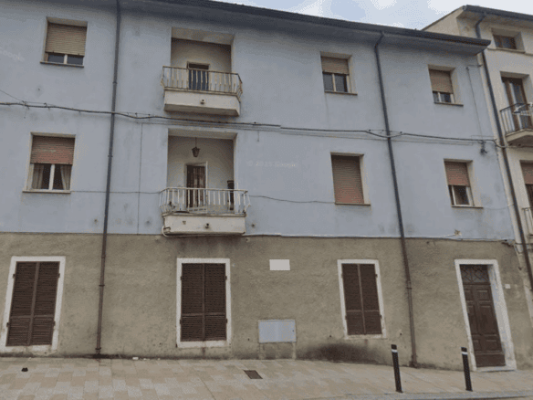 Exterior view of a renovated 3-bed apartment building in Calangianus, Sardinia.