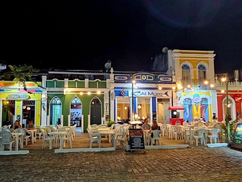 Style houses illuminated at night in Canavieiras, Bahia, Brazil.