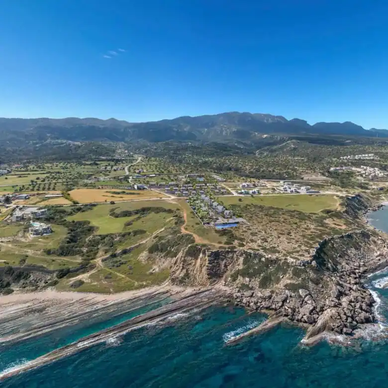 Aerial view of Deja Blue complex and surrounding coastline in Kyrenia North Cyprus.