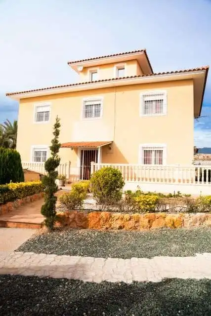 Beautiful 4-bedroom villa for sale in Totana Murcia, featuring a spacious design and lovely garden a.