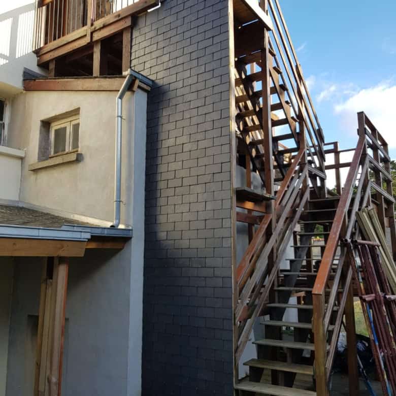 Attic renovation project with external staircase in Penmarch, Brittany, France.