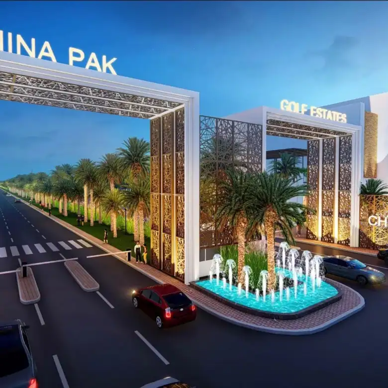 Modern entrance gate to China Pak Golf Estates in Gwadar with lush landscaping and water features.