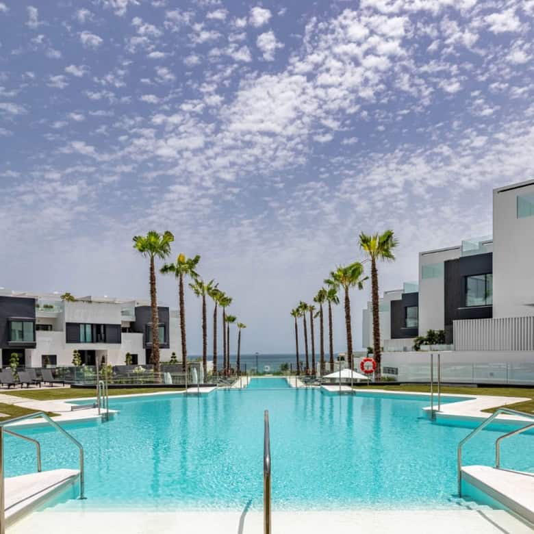 Luxury beachfront townhouse with modern design and stunning sea views in Estepona West.