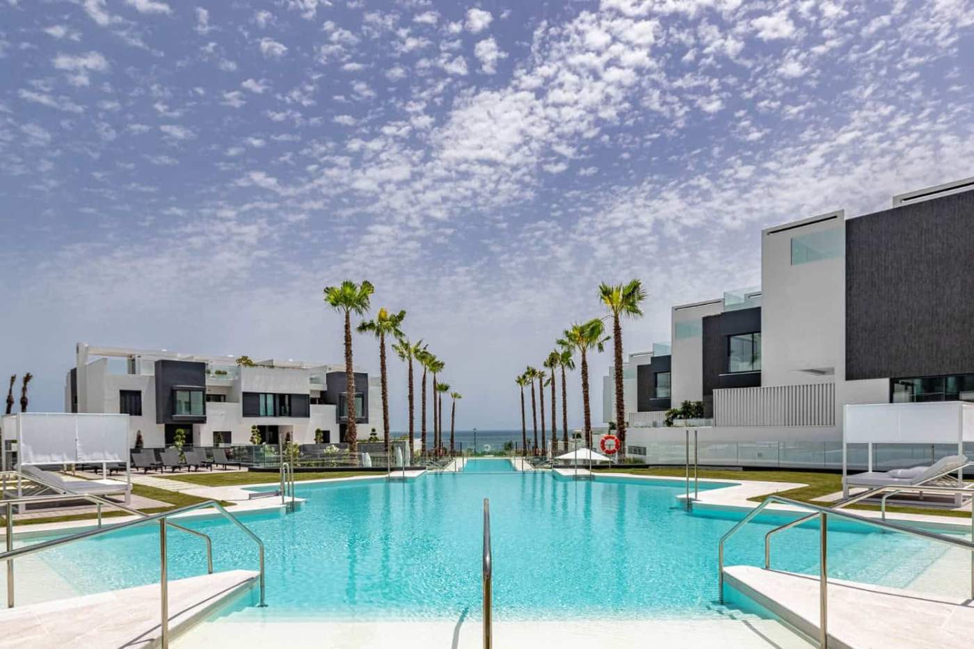 Luxury beachfront townhouse with modern design and stunning sea views in Estepona West.
