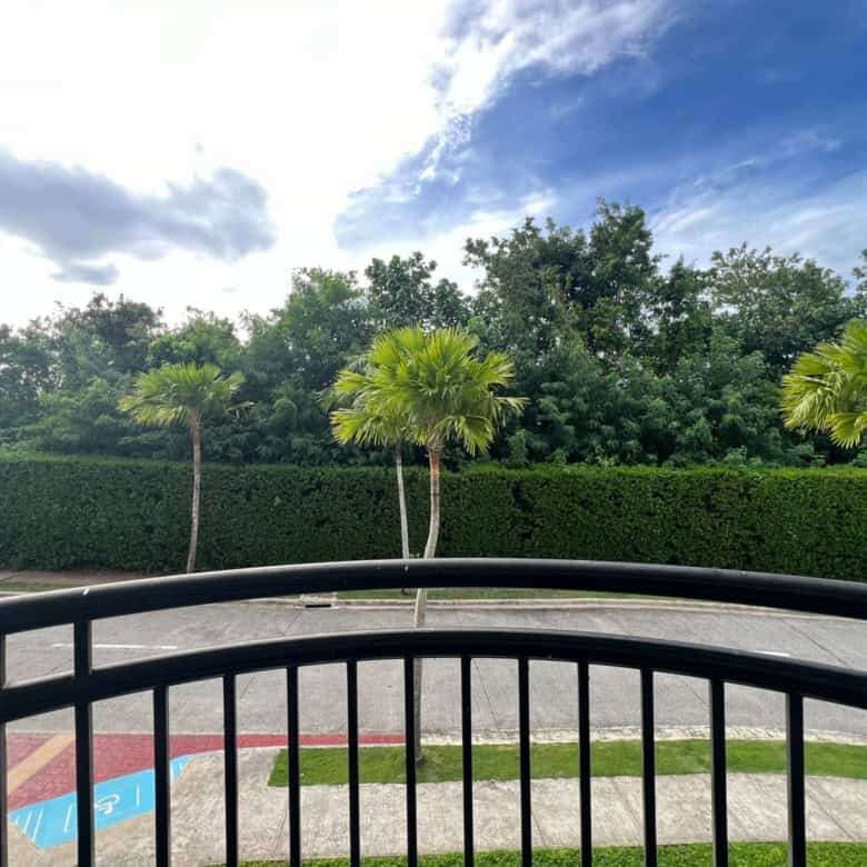 Beautiful view of Oceanway Residencies Boracay with lush greenery and palm trees.