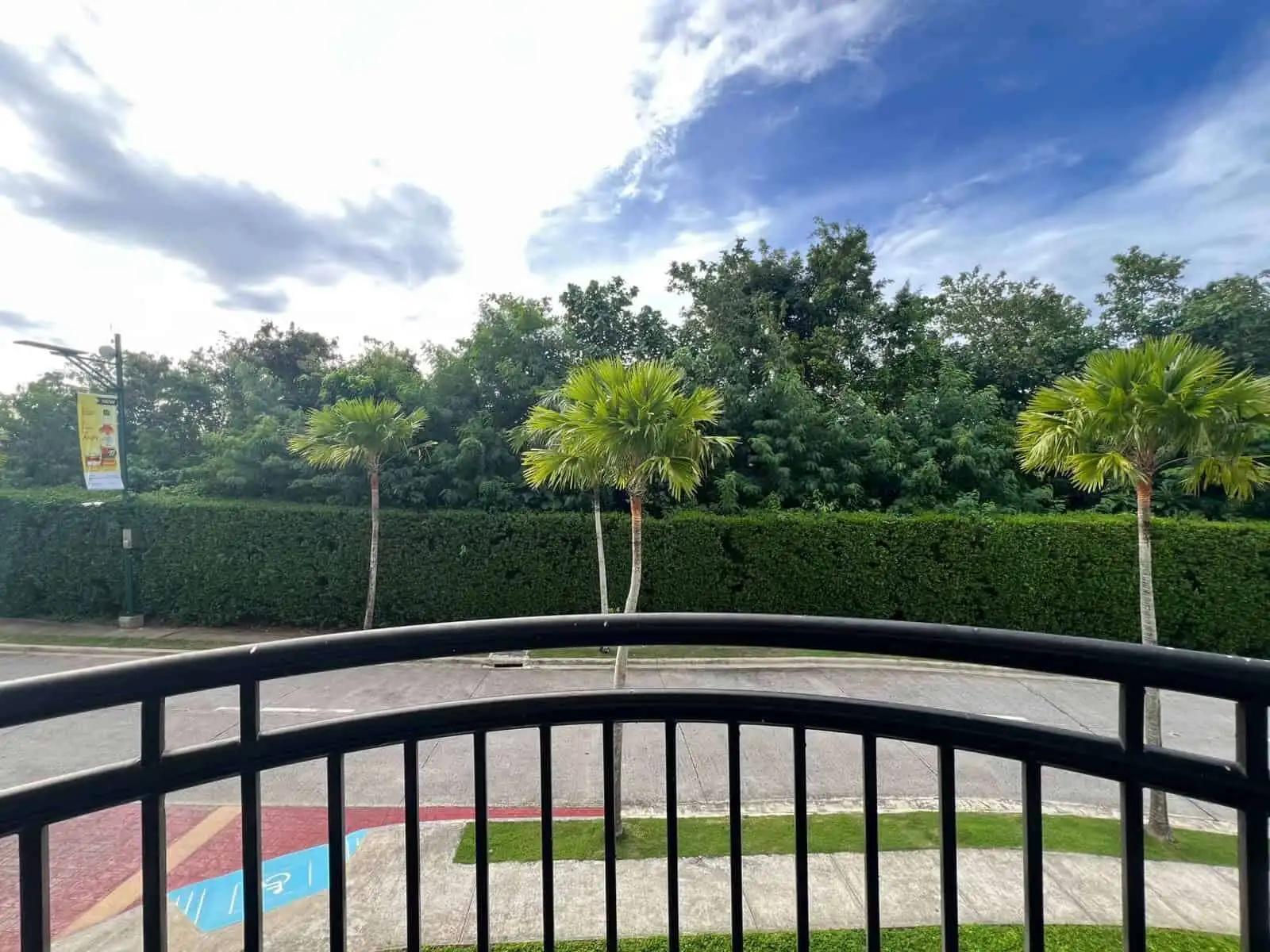 Beautiful view of Oceanway Residencies Boracay with lush greenery and palm trees.
