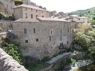 Beautiful stone estate with house, apartment, café, and bar in Olargues, Herault, ideal for luxury l.
