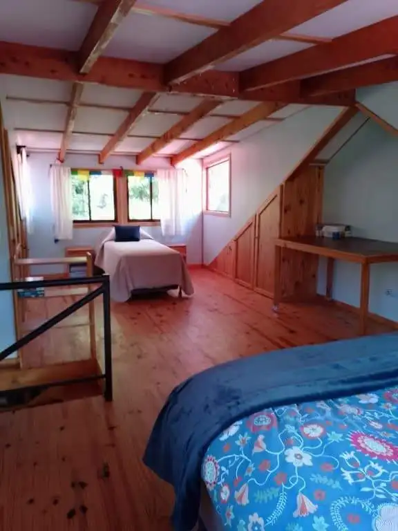 Interior of a cozy bedroom at Hush Valley Estate, Rio Blanco, San Jose, Costa Rica.