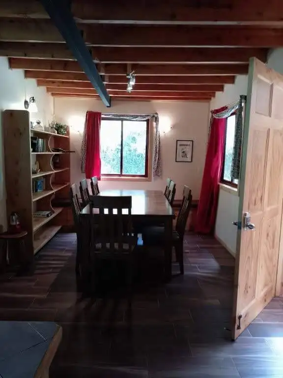 Cozy dining room at Hush Valley Estate in Rio Blanco, San Jose, Costa Rica.