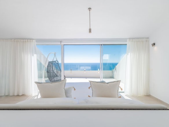 Elegant bedroom with sea view in Benalmadena, Costa del Sol, Spain.