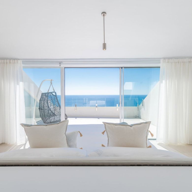 Elegant bedroom with sea view in Benalmadena, Costa del Sol, Spain.