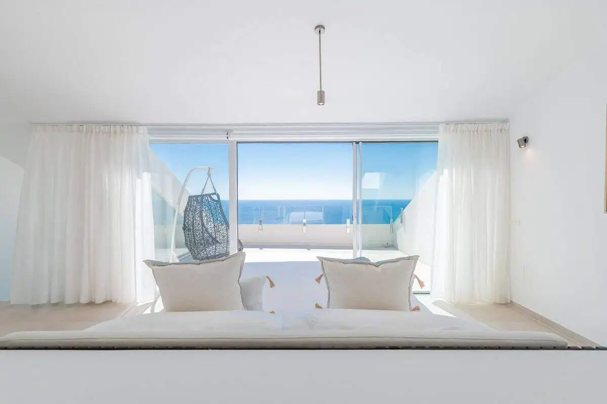 Elegant bedroom with sea view in Benalmadena, Costa del Sol, Spain.