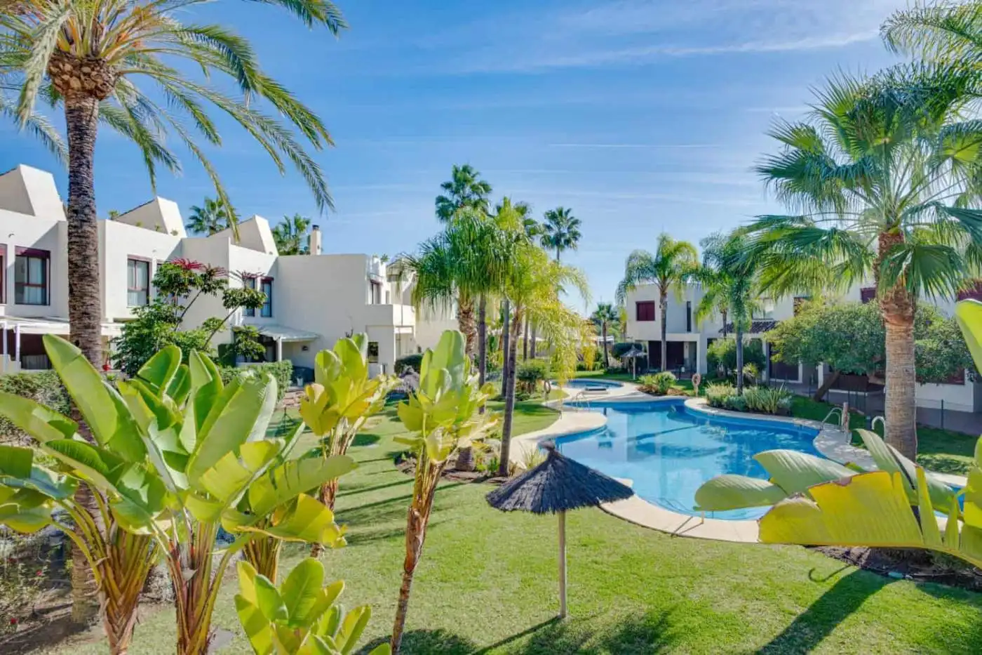 Beautiful tropical garden with pool at a luxury townhouse in Cancelada, Estepona. Perfect for relaxi.