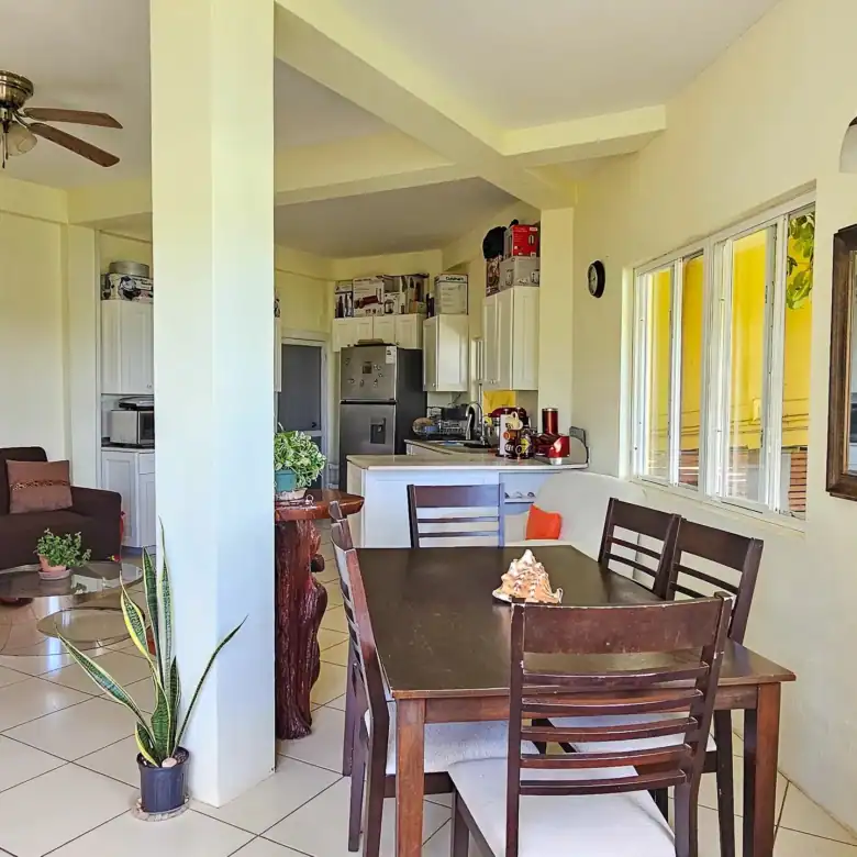 Elegant living and dining area with ocean views in Dominion Beach.