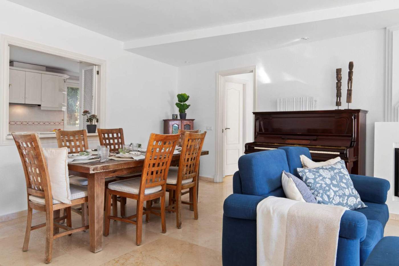 Elegant living and dining area with ocean views in Dominion Beach.