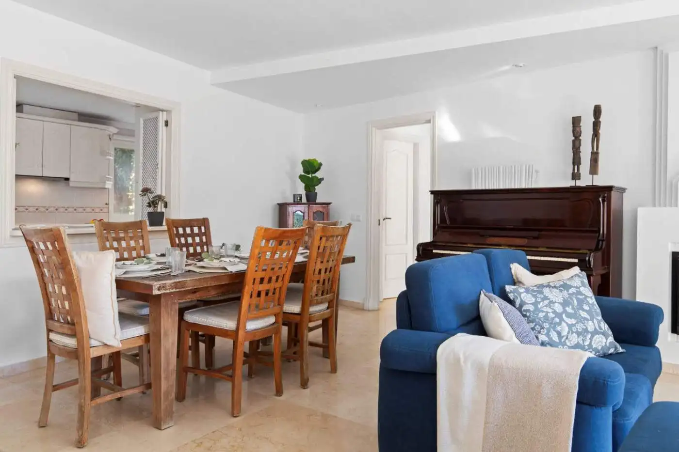Elegant living and dining area with ocean views in Dominion Beach.