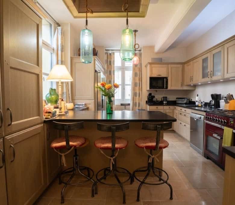 Spacious kitchen in a stunning 5-bedroom house for sale in Chateaudun, France, featuring modern appl.