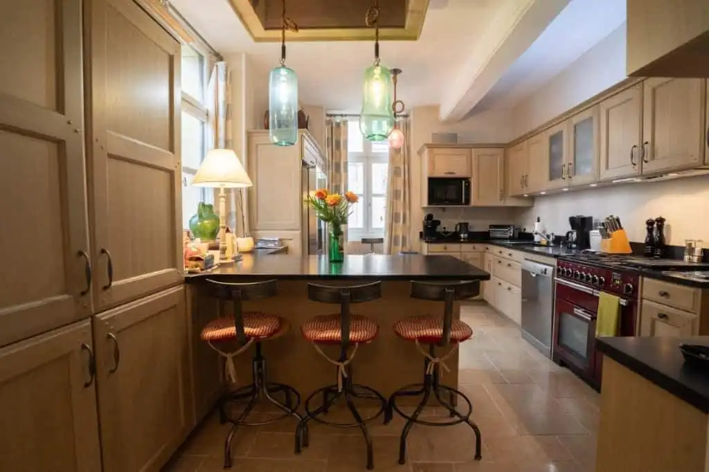 Spacious kitchen in a stunning 5-bedroom house for sale in Chateaudun, France, featuring modern appl.
