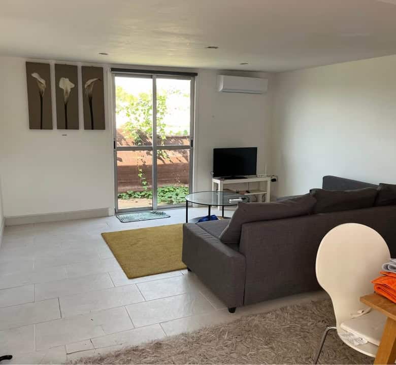 Interior view of a modern 2-bedroom static mobile home in Camping Castillejo Fortuna, Spain.