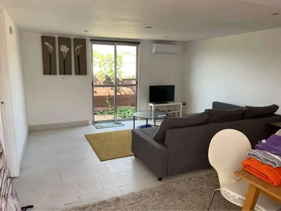 Interior view of a modern 2-bedroom static mobile home in Camping Castillejo Fortuna, Spain.