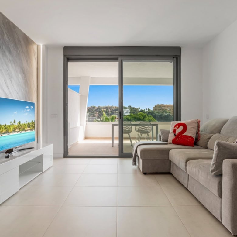 Modern 2-Bedroom Penthouse with balcony in Selwo Estepona, featuring spacious living area and scenic.
