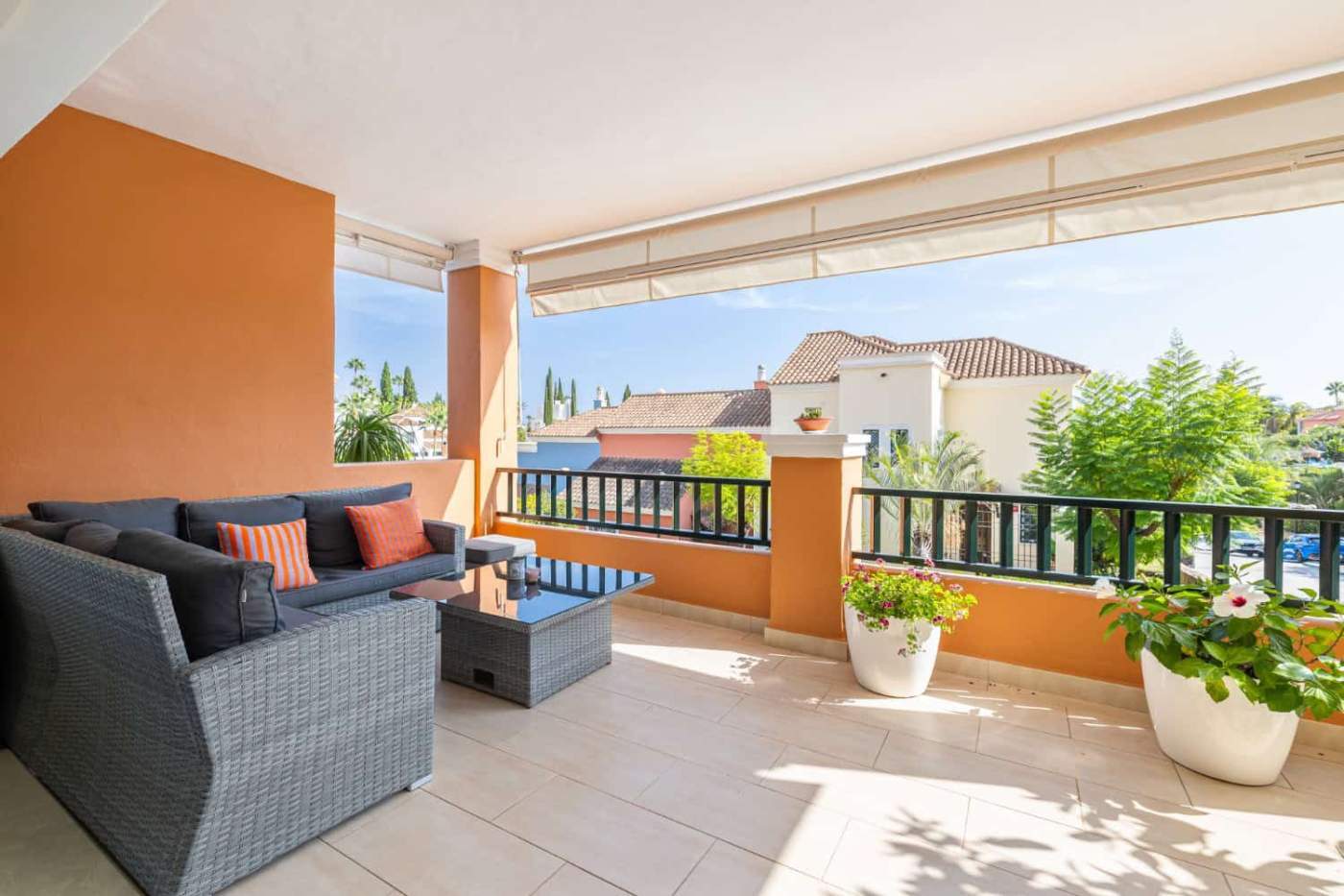 Refurbished Townhouse Balcony in Brisas del Sur Balcony of a refurbished townhouse in Brisas del Sur, Nueva Andalucía, with outdoor seating and scen.
