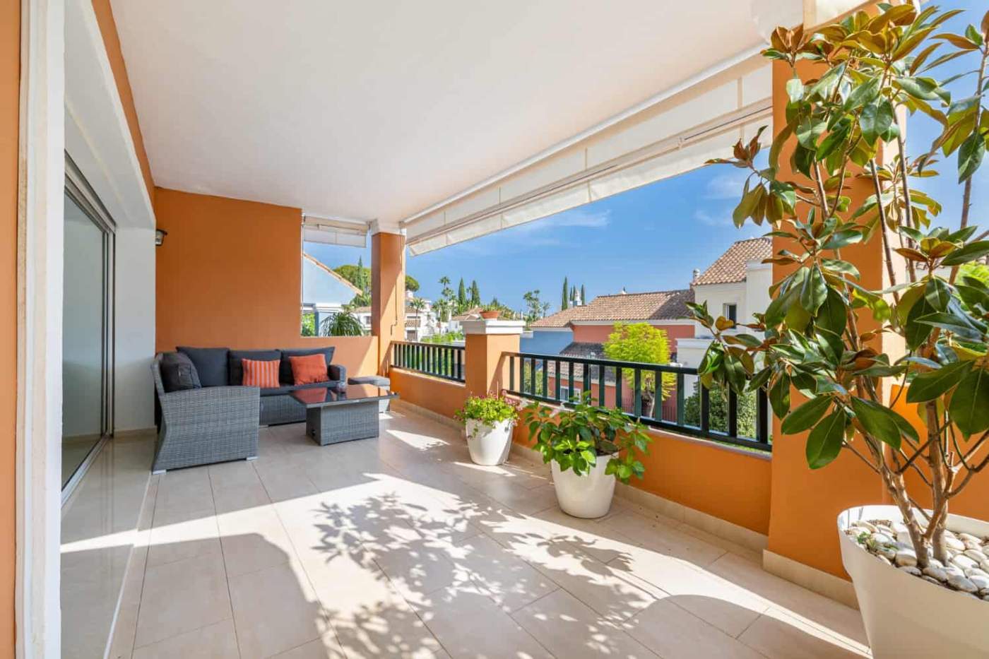 Refurbished Townhouse Balcony in Brisas del Sur Balcony of a refurbished townhouse in Brisas del Sur, Nueva Andalucía, with outdoor seating and scen.