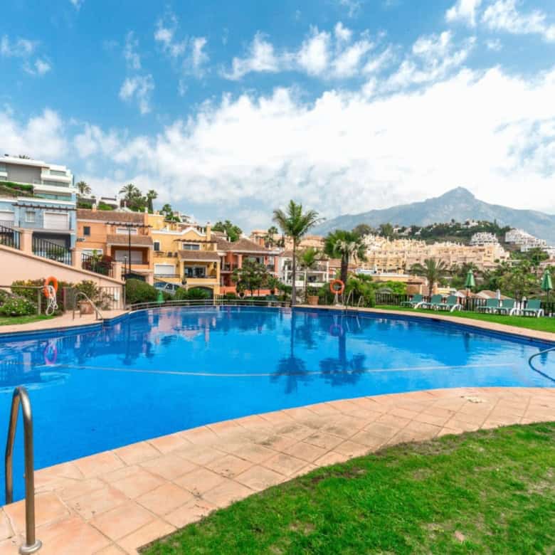 Swimming pool at Brisas del Sur townhouse complex, Nueva Andalucía, Spain.