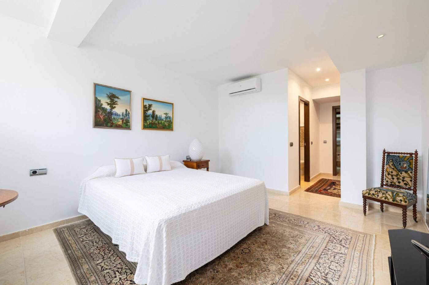 Refurbished Townhouse in Brisas del Sur Modern bedroom in Brisas del Sur townhouse with stylish decor and comfortable furnishings.