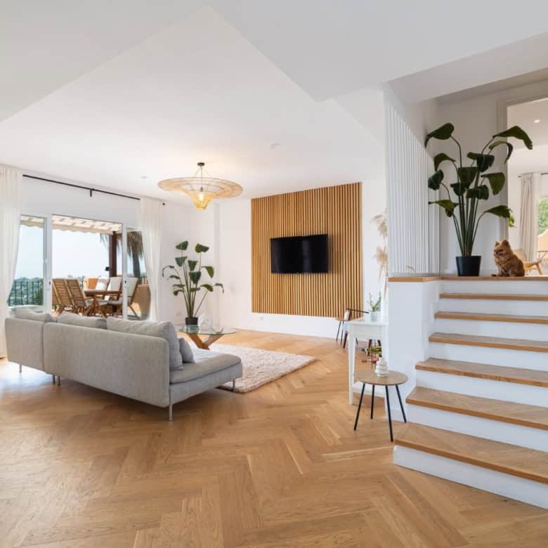 Modern renovated penthouse with spacious living area and panoramic south-facing views.