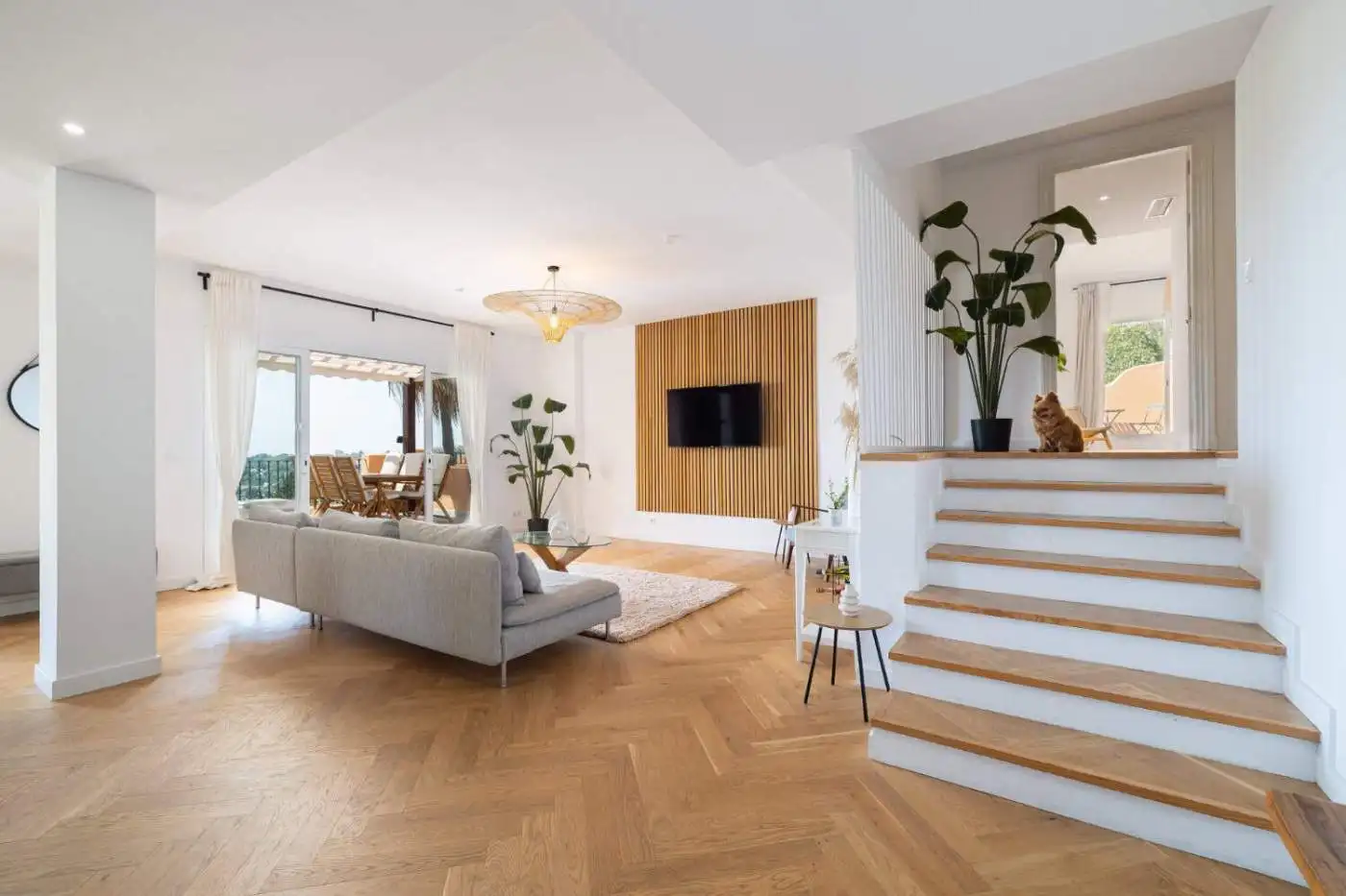 Modern renovated penthouse with spacious living area and panoramic south-facing views.