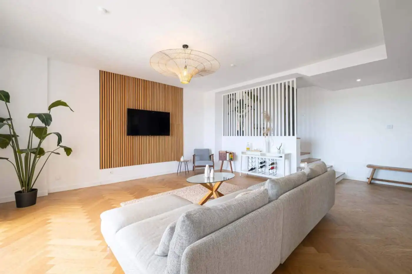 Penthouse living room with modern decor and panoramic south views.