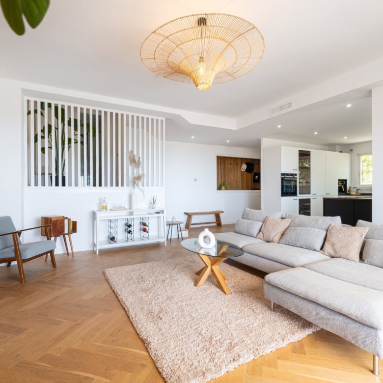 Spacious living room with panoramic city views and stylish decor. Bright, modern interior perfect fo.