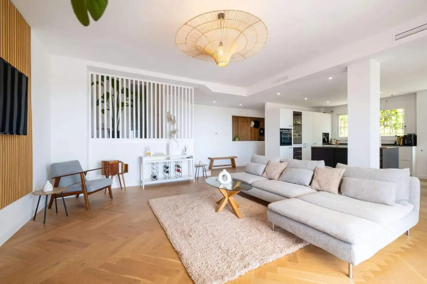 Spacious living room with panoramic city views and stylish decor. Bright, modern interior perfect fo.