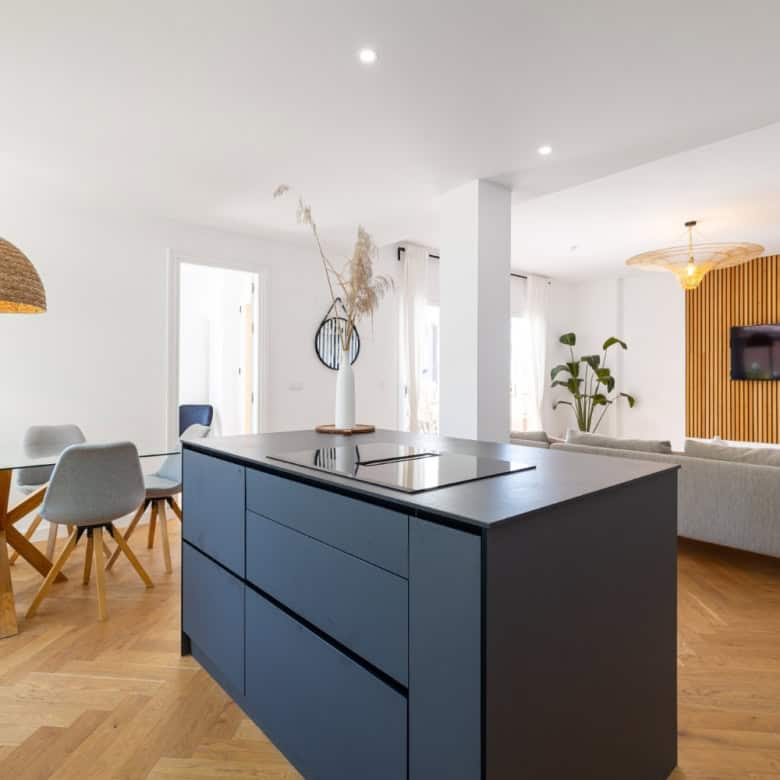Stylish penthouse interior with modern decor and expansive south-facing panoramic windows.