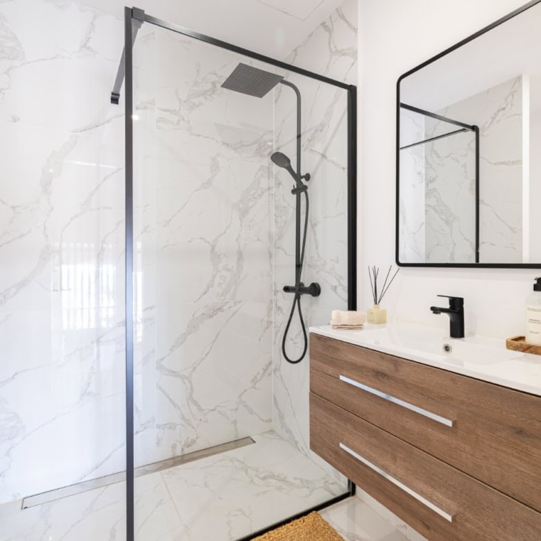 Luxurious bathroom in a modern penthouse with sleek design and marble finishes.
