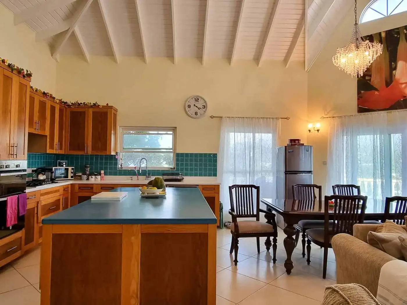 Spacious kitchen and dining area in a luxury villa in Saint George, Grenada Caribbean.