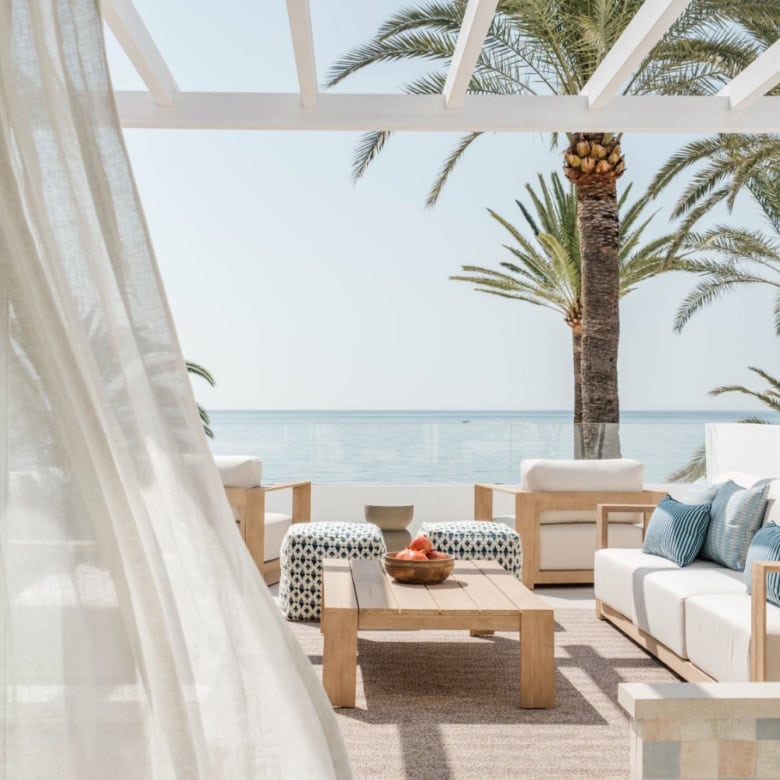 Elegant beachfront semi-detached home in Marbella Golden Mile with ocean views.