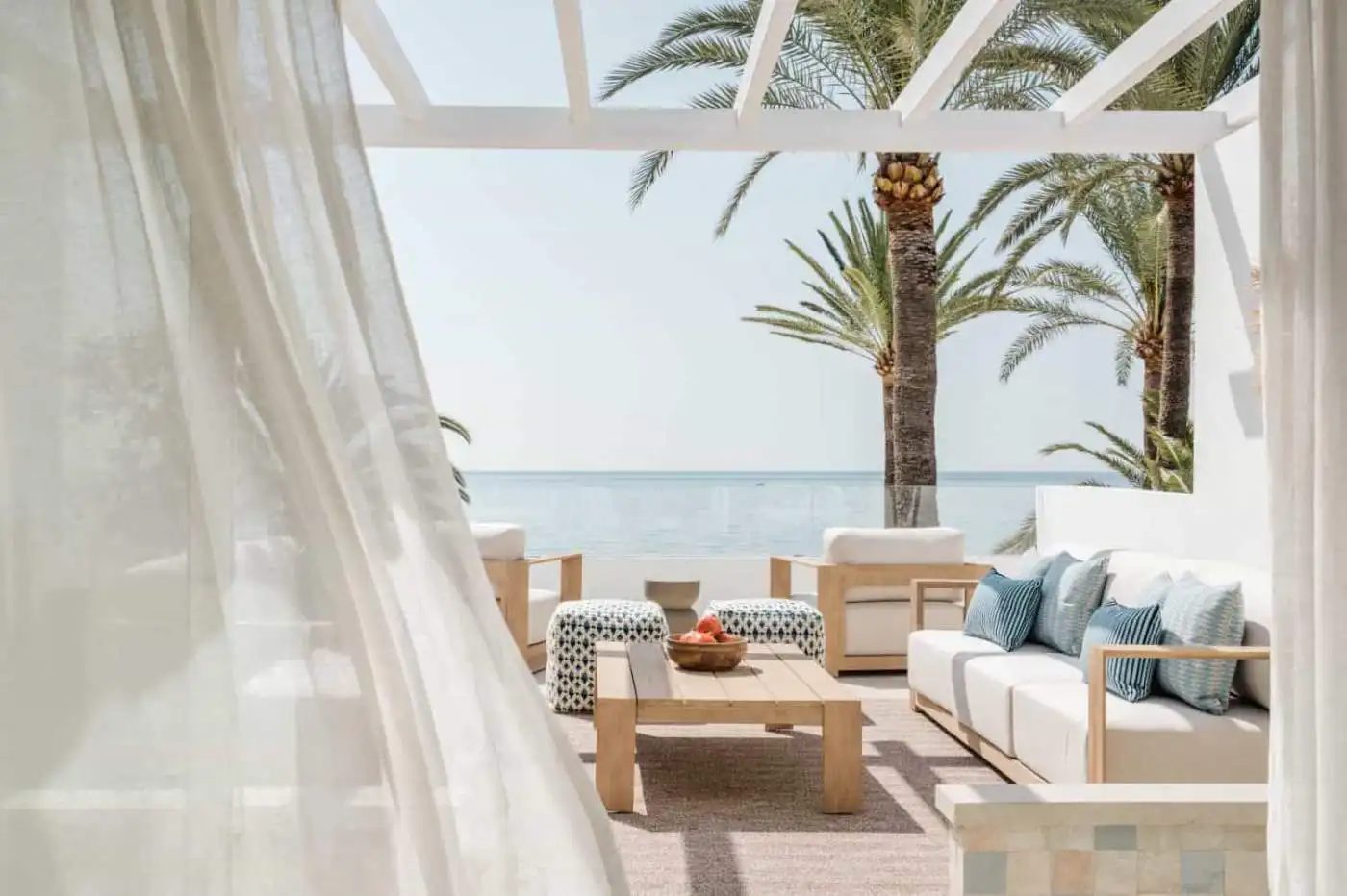 Elegant beachfront semi-detached home in Marbella Golden Mile with ocean views.