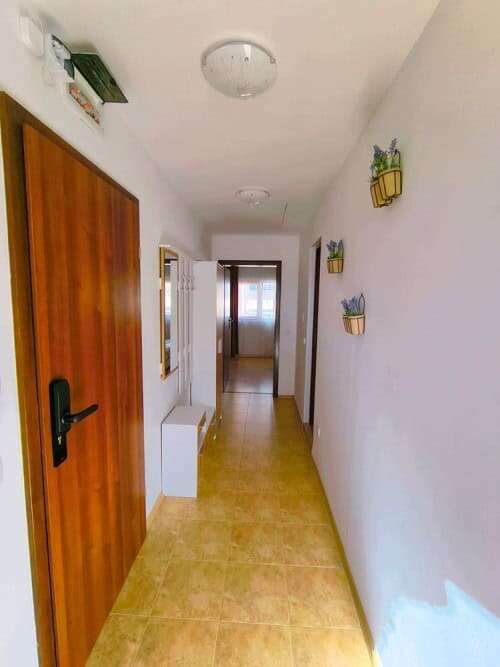 Bright hallway of a 1-bedroom apartment close to the sea in Sveti Vlas, featuring simple decor and n.