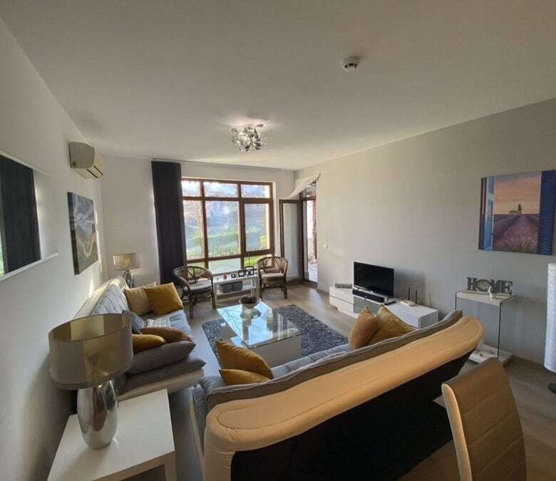 Spacious 1-bedroom apartment with modern decor in Vineyards SPA Resort, near the sea.