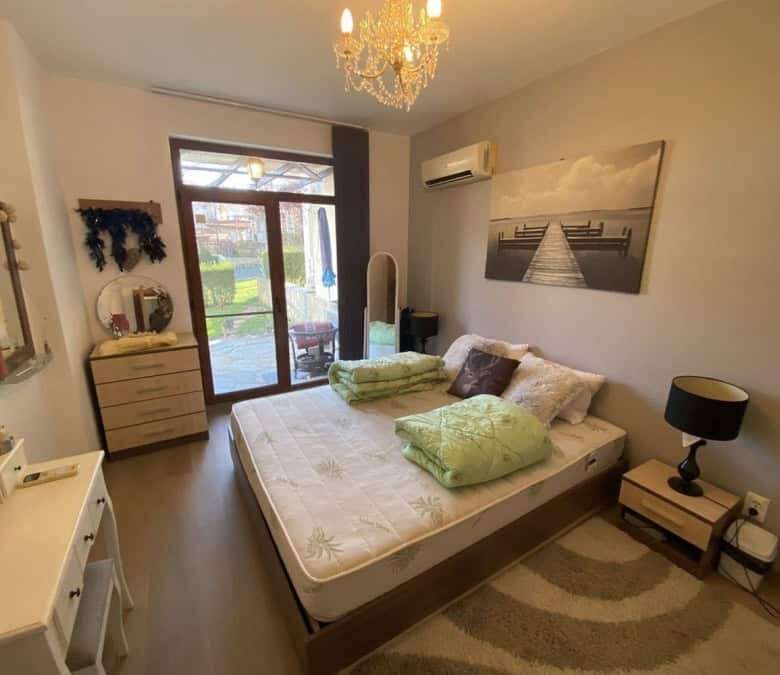 Cozy 1-bedroom apartment in Vineyards SPA Resort near the sea, with modern decor and balcony.