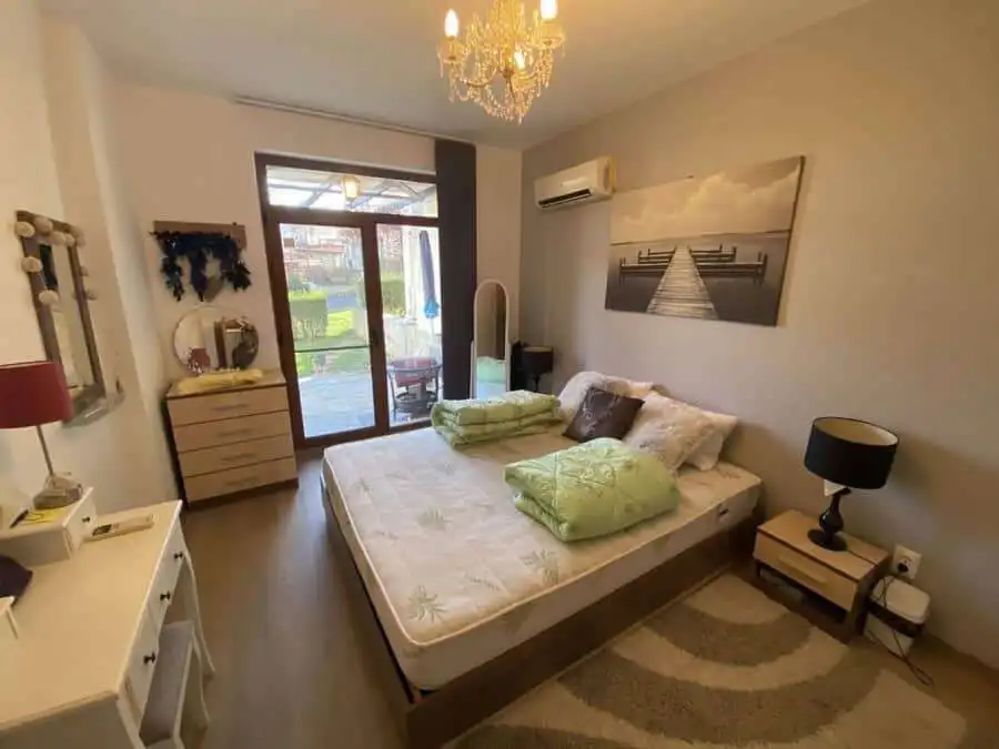 Cozy 1-bedroom apartment in Vineyards SPA Resort near the sea, with modern decor and balcony.