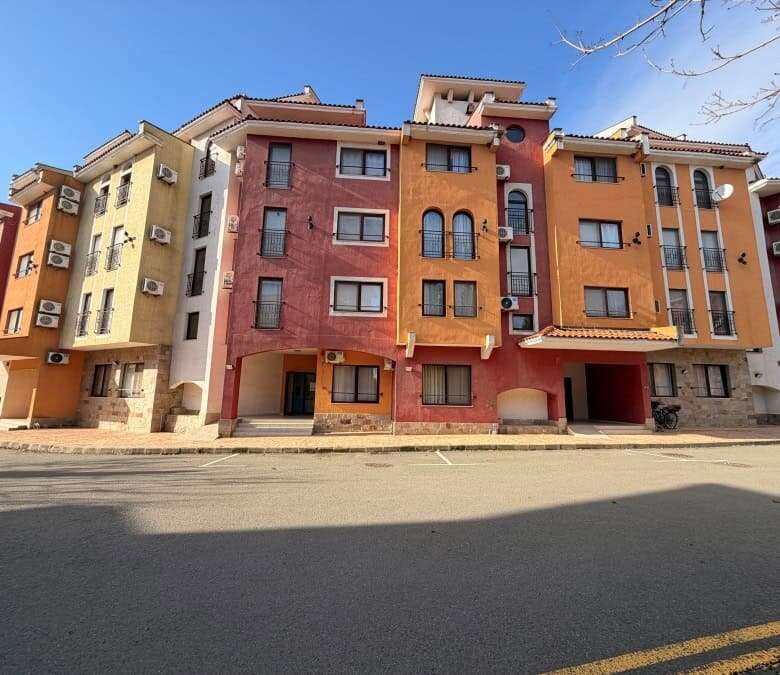 Bright apartment building with pool views in Marina Cape, Aheloy, Bulgaria.