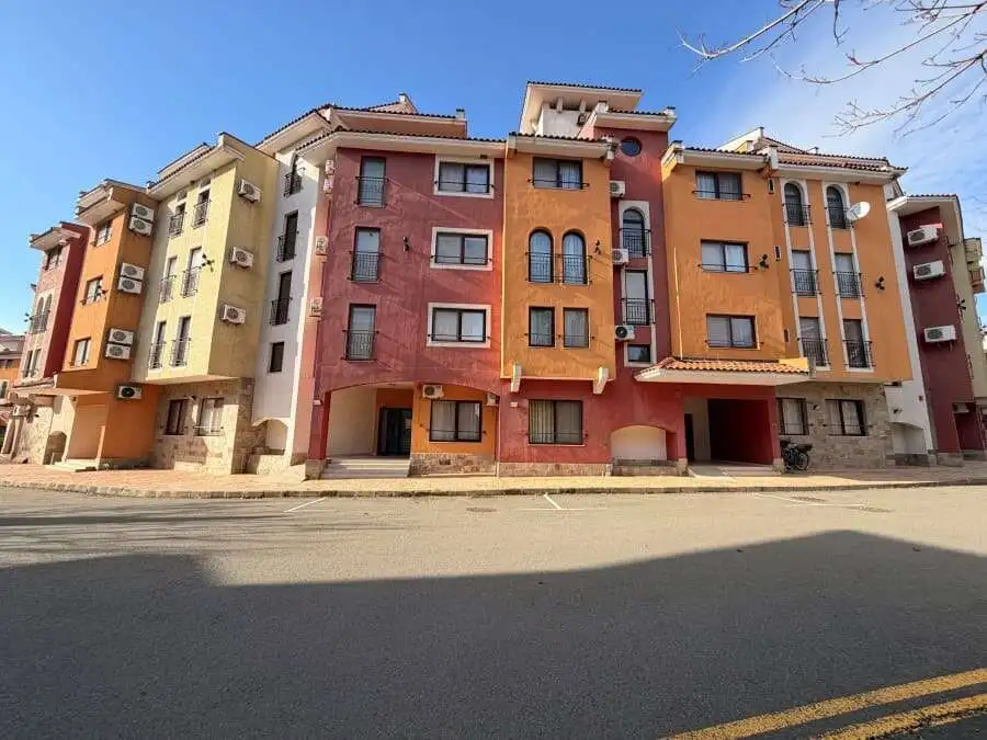 Bright apartment building with pool views in Marina Cape, Aheloy, Bulgaria.
