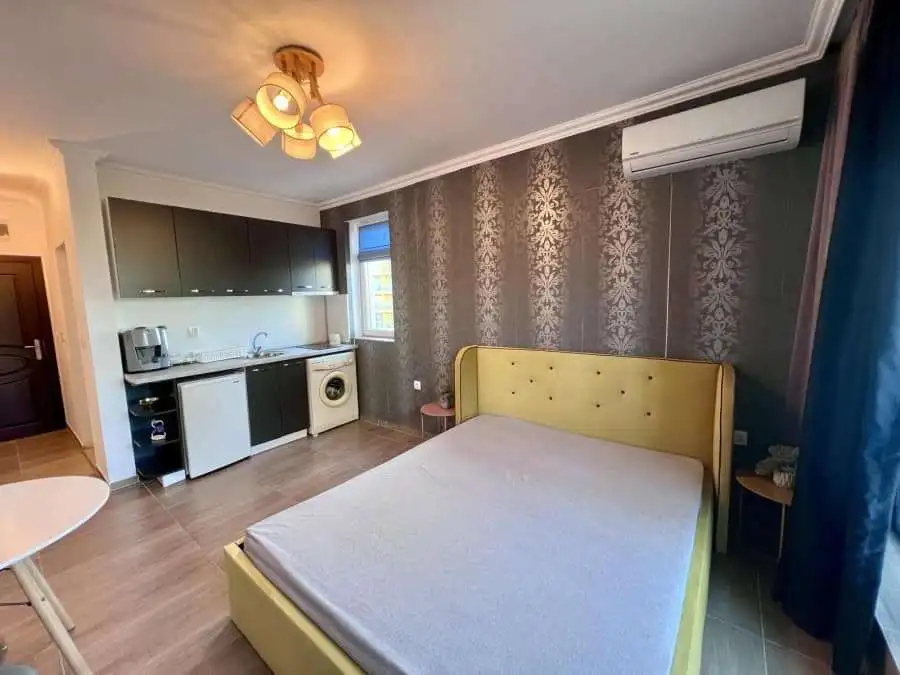 Bright studio apartment in Magnolia Residence 5, Sunny Beach, with modern furnishings and compact ki.