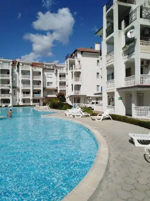 Pool view of a modern apartment complex in Sunny Beach, Bulgaria.