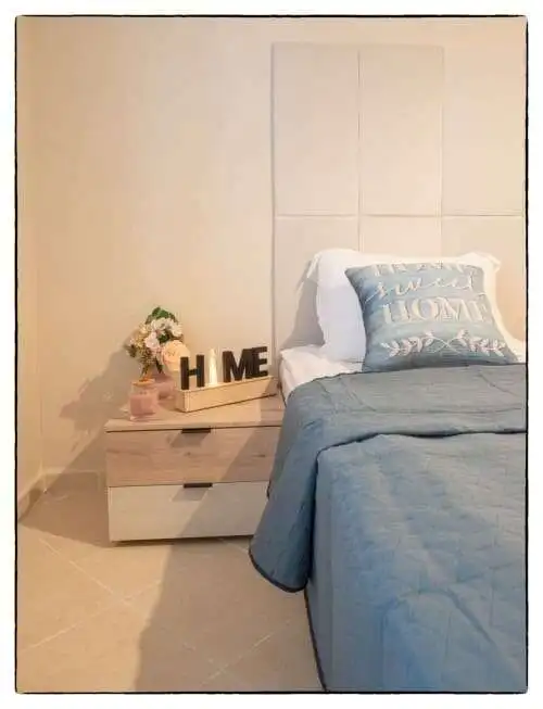 Cozy bedroom in a modern 2-bedroom apartment with pool view in Sunny Beach center.