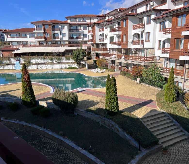 View of Gardenia Hills residential complex with swimming pool and landscaped gardens near Sunny Beac.