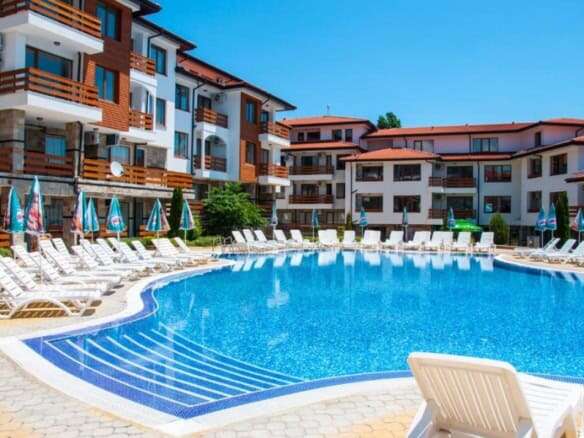 Modern apartment complex with swimming pool at Gardenia Hills, Sunny Beach.